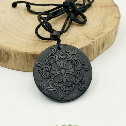 Cross-border procurement Russian shungite, middle-aged, simple, handmade, pure natural stone texture 35 40mm pendant